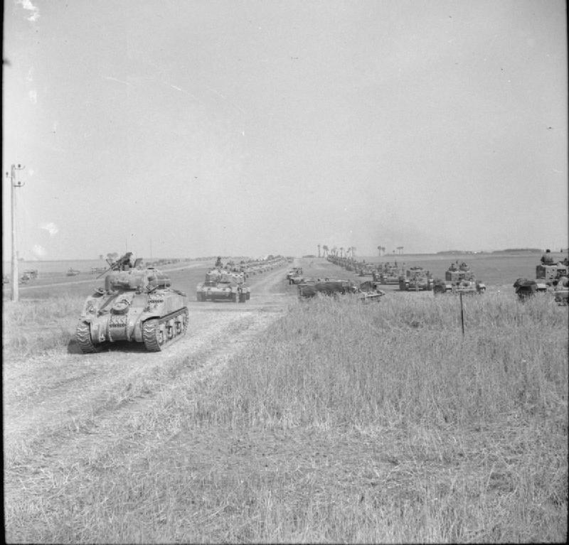 Sherman and Cromwell tanks of the 1st Polish Armoured Division moving across Normandy